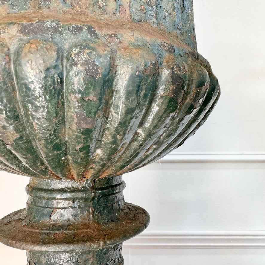 Pair of High Victorian Cast Iron Campana Urns on Plinths