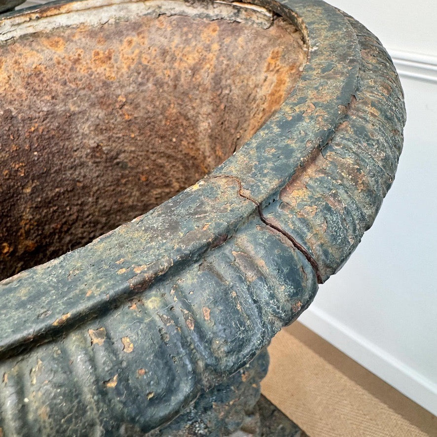 Pair of High Victorian Cast Iron Campana Urns on Plinths