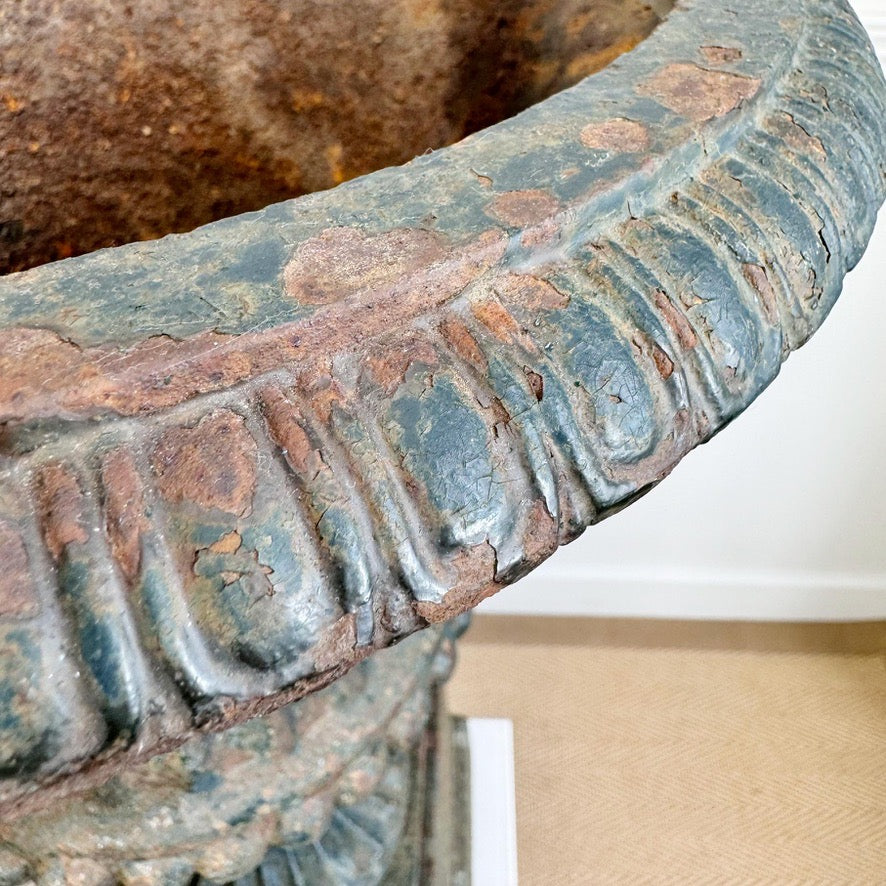 Pair of High Victorian Cast Iron Campana Urns on Plinths