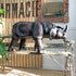 leather antique rhinoceros foots tool on a vintage garden bench with a rustic background