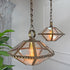 Two hanging vintage french glass lantern pendant lights with geometric faceted clear glass shades and antique bronze metal frames, shown in a softly lit interior setting.