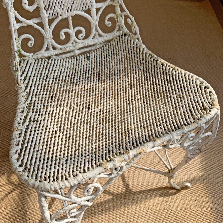 An Ornate White Regency Wirework Iron Chair