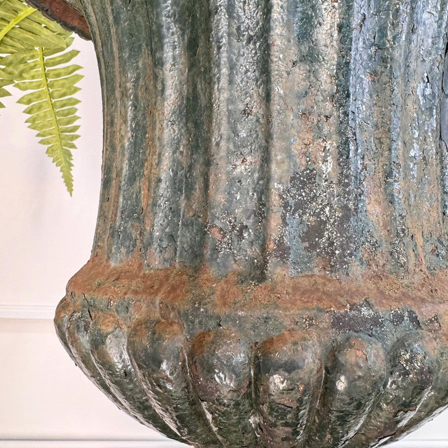 Pair of High Victorian Cast Iron Campana Urns on Plinths