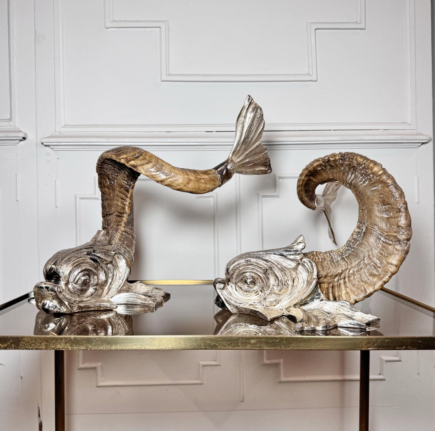 Gabriella Crespi 'Coppia di Delfini' Pair of Rams Horn and Silvered Bronze Mythical Dolphins Each Signed to Base