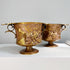 Pair of Ferdinand Barbedienne Low Handled Bronze Urns after the Zaffoli Borghese Vase, with sculpted relief details, including faces, foliage, and floral motifs, shown on a white surface against a light gray background.