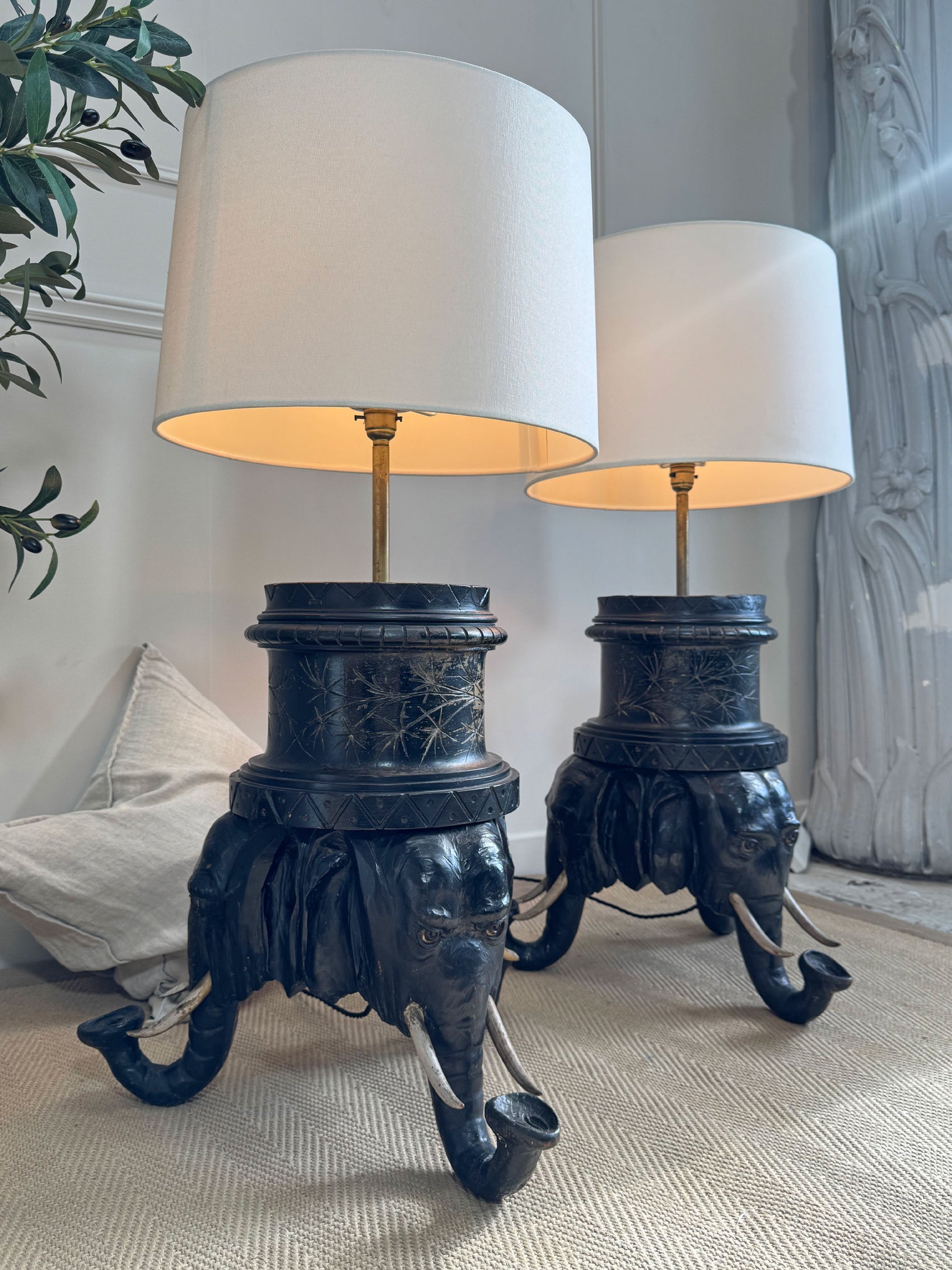 An Exceptional Pair of Reimagined 19th-Century Anglo-Indian Carved Hardwood Elephant Lamps