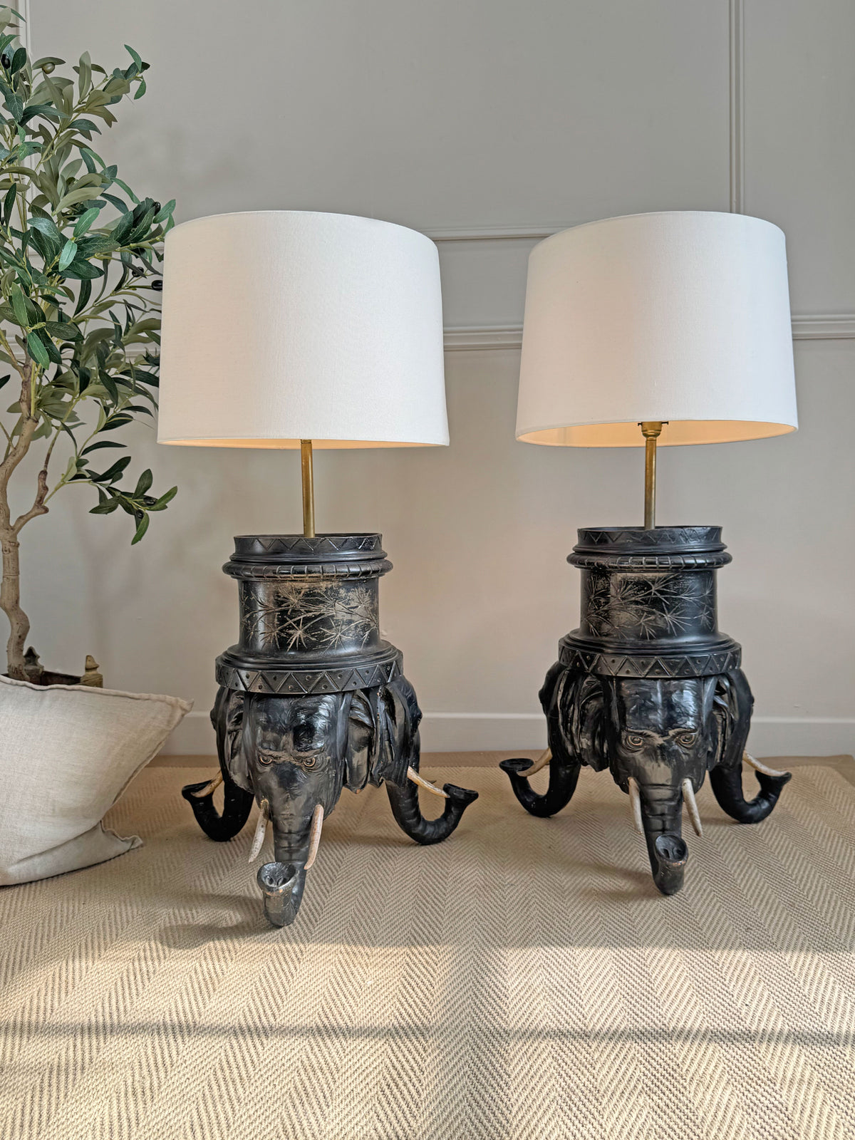 An Exceptional Pair of Reimagined 19th-Century Anglo-Indian Carved Hardwood Elephant Lamps