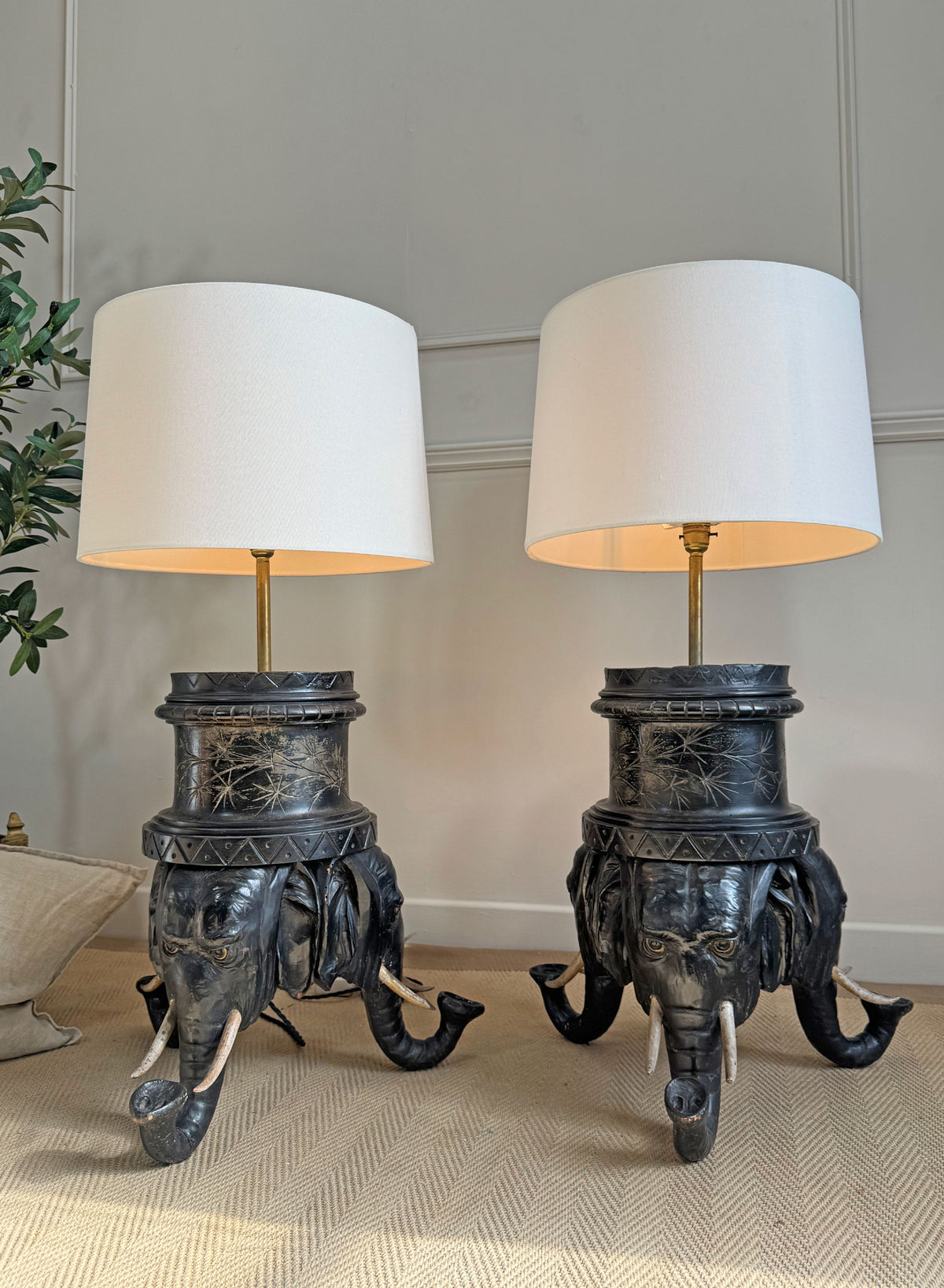 An Exceptional Pair of Reimagined 19th-Century Anglo-Indian Carved Hardwood Elephant Lamps