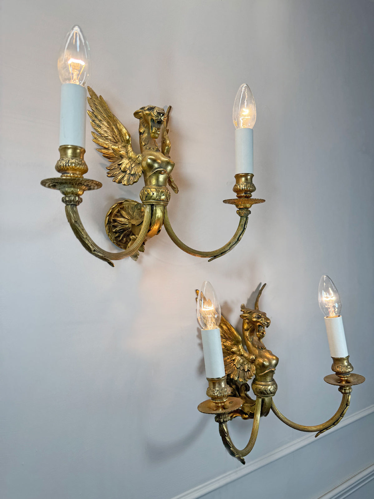Pair of Late 19th Century Gilded Bronze Female Griffin Empire Wall Lights