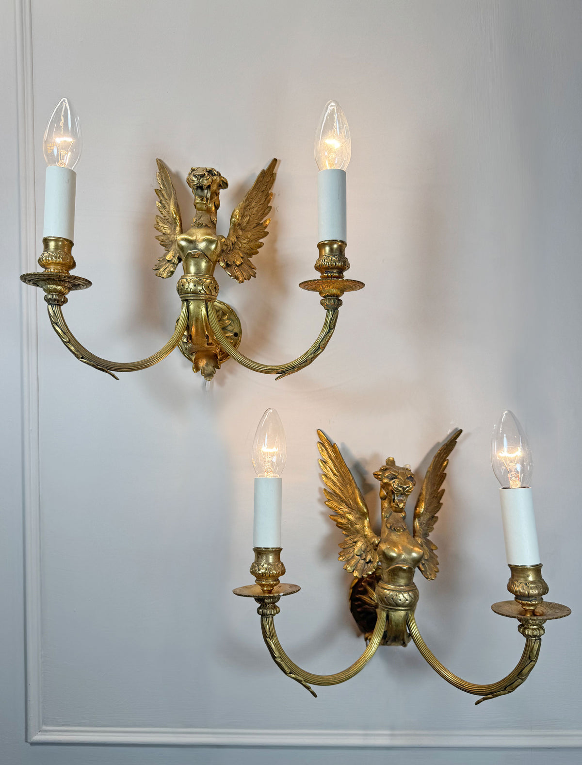 Pair of Late 19th Century Gilded Bronze Female Griffin Empire Wall Lights