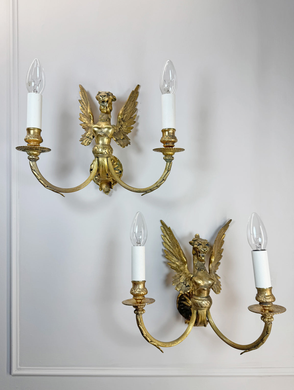 Pair of Late 19th Century Gilded Bronze Female Griffin Empire Wall Lights