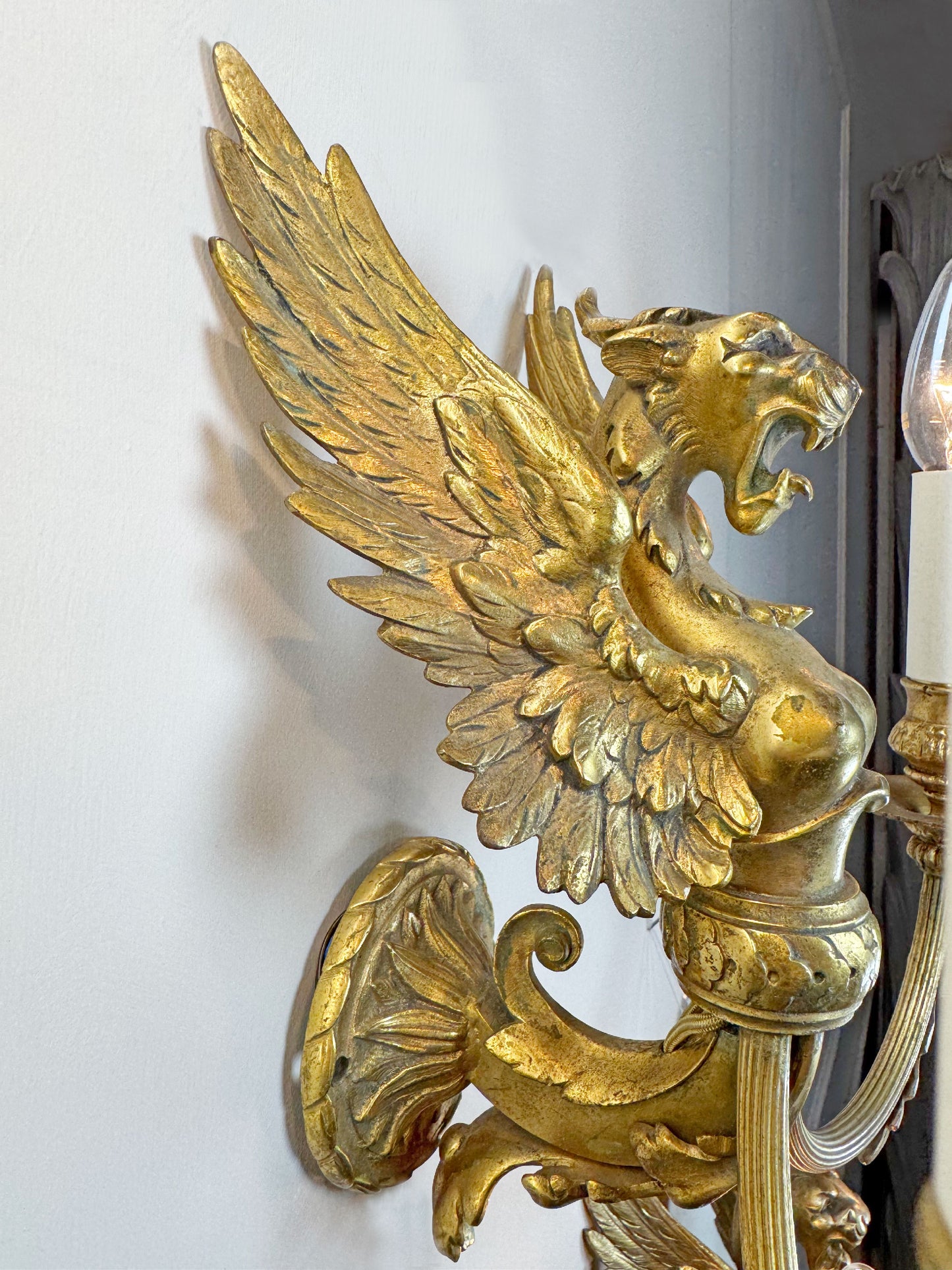 Pair of Late 19th Century Gilded Bronze Female Griffin Empire Wall Lights