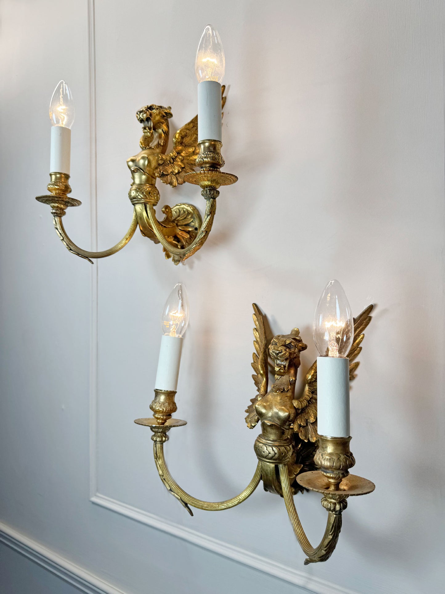 Pair of Late 19th Century Gilded Bronze Female Griffin Empire Wall Lights