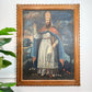 18th Century Cuzco School Oil Painting on Canvas Pope Gregory XIII in white and blue robes, holding a staff, displayed on a white wall with a green plant leaf visible at the left edge.