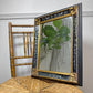 Late 19th Century Gilt and Black Eglomise Wall Mirror