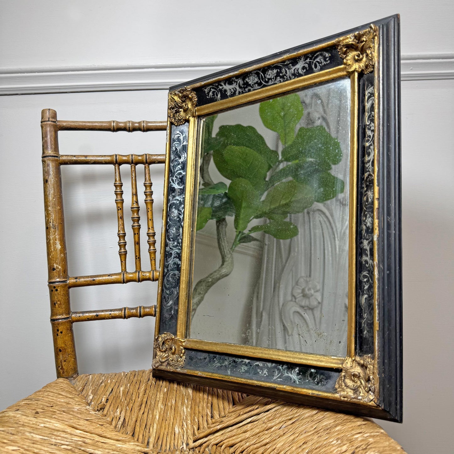 Late 19th Century Gilt and Black Eglomise Wall Mirror