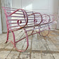 Early Victorian Scroll Arm Wrought Iron Pink Bench of Exceptional Proportions