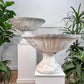 Great pair of composite garden fountains, French and hand made in the early 20th century. Original white paint to the exterior, each fountain is in two parts comprising the base and top. Both still have the original pipe for the water in place. Could also be easily re-purposed as a pair of decorative urns.