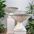 Great pair of composite garden fountains, French and hand made in the early 20th century. Original white paint to the exterior, each fountain is in two parts comprising the base and top. Both still have the original pipe for the water in place. Could also be easily re-purposed as a pair of decorative urns.