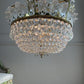 An Exceptionally Rare and Elegant French Empire Crown and Basket Crystal Chandelier Circa 1900–1910