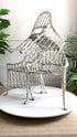 Exceptionally rare set of four chairs, Brazilian, circa 1970. Highly unusual sweeping faux Bamboo and Palm Leaf seat design, in Cast Aluminium.