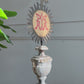 Painted Sunburst Mounted on a Baroque Silver Gilt Altar Vase 18th Century