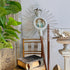 processional sunburst / cross, wooden rays emanate from the central image of the Virgin Mary set behind glass, topped with a metal crown and cross. The sunburst is set within a pole that would have been carried aloft during religious processions